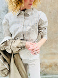 TENSIONE IN CAMICIA QUADRI